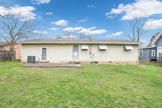 101 Cherokee Dr, Westerville, OH 43081 - back of property with central air condition unit, a lawn, a patio area, and fence