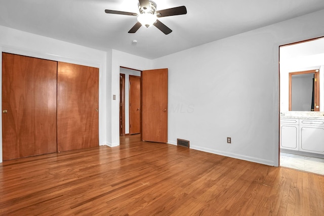 101 Cherokee Dr, Westerville, OH 43081 - unfurnished bedroom featuring a closet, light wood-type flooring, ensuite bathroom, baseboards, and visible vents