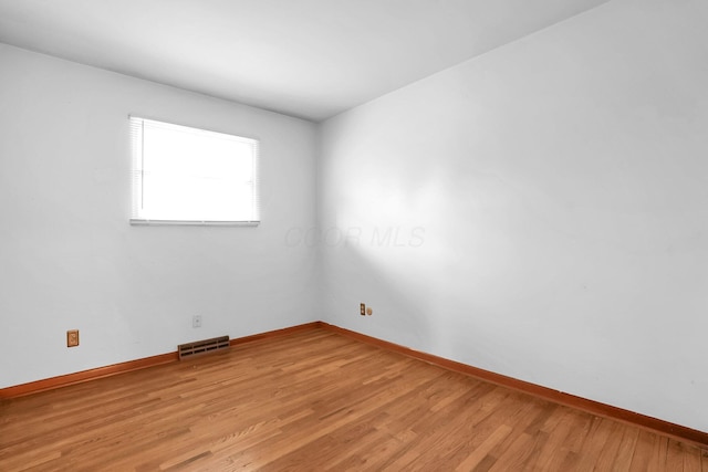 101 Cherokee Dr, Westerville, OH 43081 - spare room featuring baseboards, visible vents, and light wood-style floors