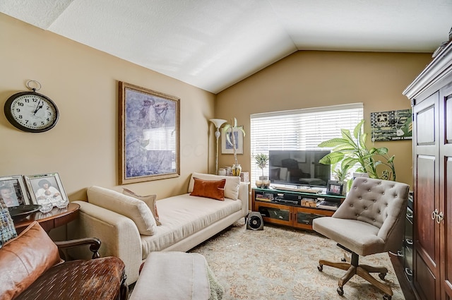 carpeted living room featuring vaulted ceiling