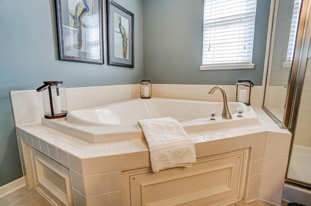 bathroom featuring a garden tub