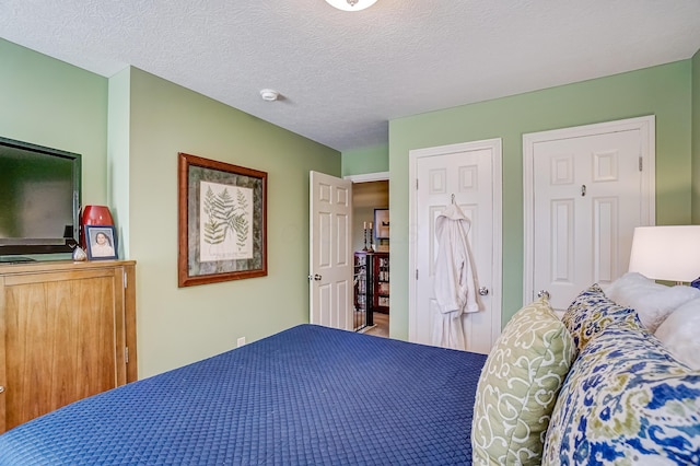 bedroom with a textured ceiling