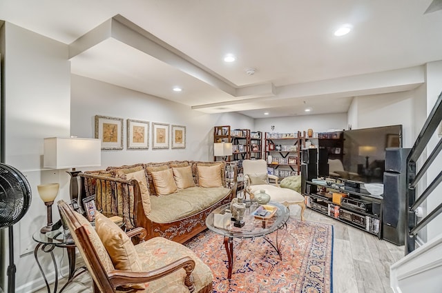 living room with recessed lighting and wood finished floors