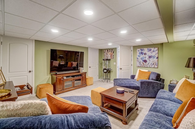 living room featuring recessed lighting, a paneled ceiling, carpet floors, and baseboards