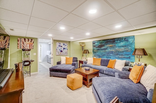 carpeted living area featuring visible vents, recessed lighting, a paneled ceiling, and baseboards