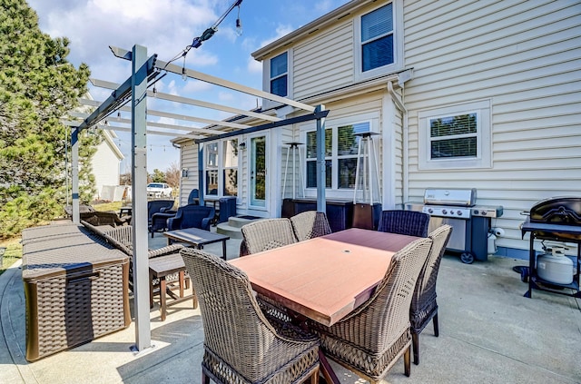 view of patio / terrace featuring outdoor dining space, a pergola, and grilling area