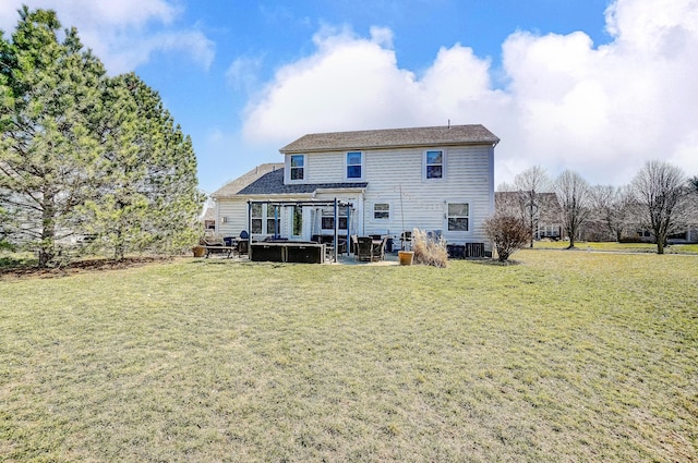 back of property featuring a patio, cooling unit, and a lawn