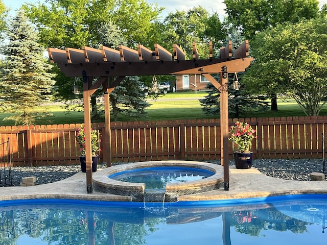 view of pool featuring a fenced in pool, an in ground hot tub, and a fenced backyard