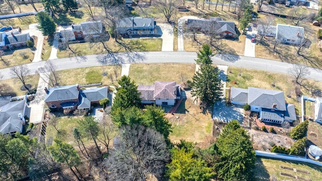 birds eye view of property with a residential view