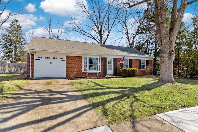 single story home with driveway, fence, a front yard, a garage, and brick siding