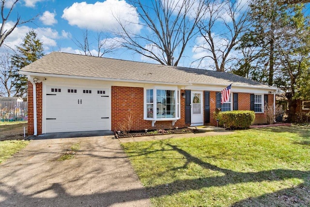 single story home featuring brick siding, an attached garage, a shingled roof, a front lawn, and driveway