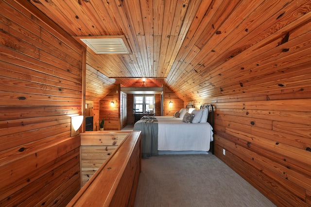 unfurnished bedroom with visible vents, dark carpet, wooden walls, wooden ceiling, and vaulted ceiling