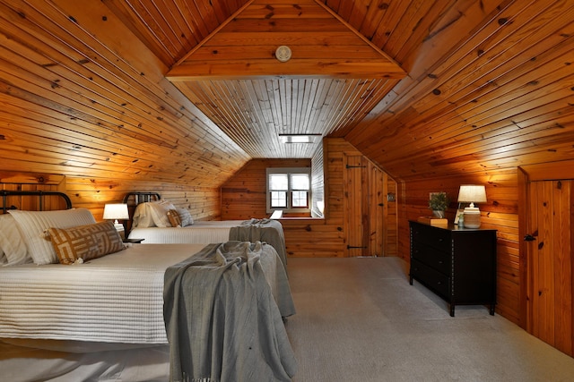 carpeted bedroom featuring wood walls, wooden ceiling, and vaulted ceiling