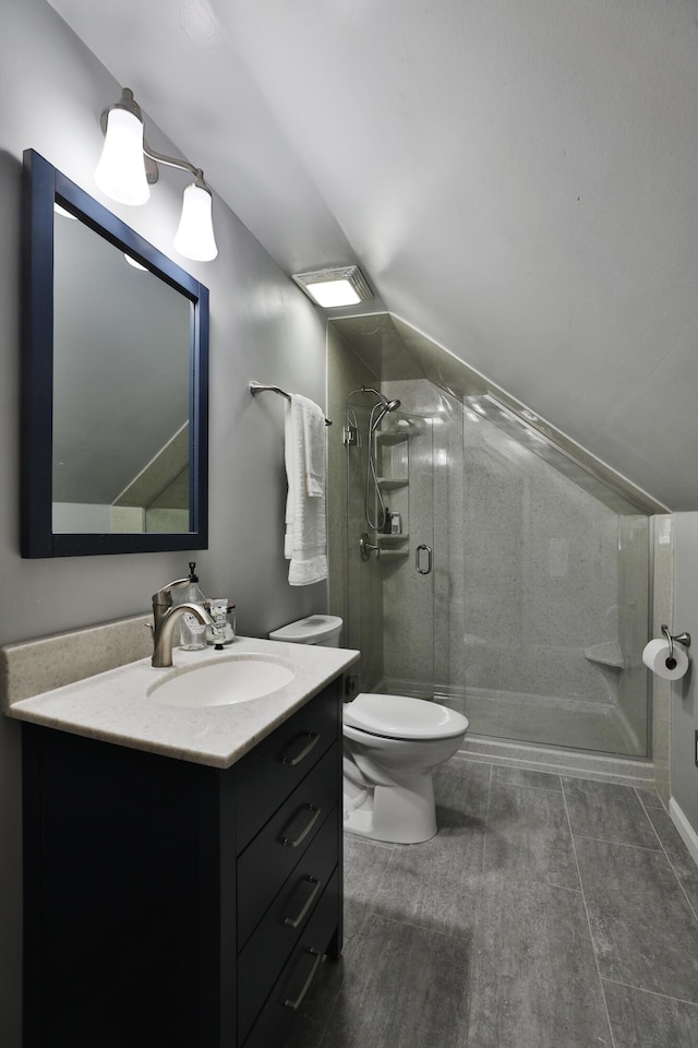 full bath with toilet, a stall shower, and vanity