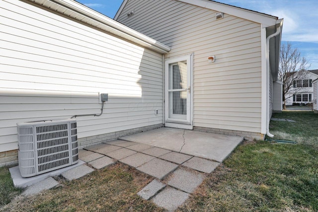 back of property featuring a patio area and cooling unit