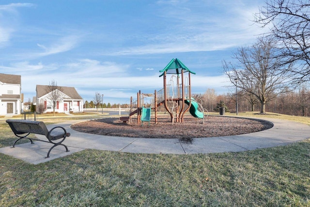 community play area featuring a lawn