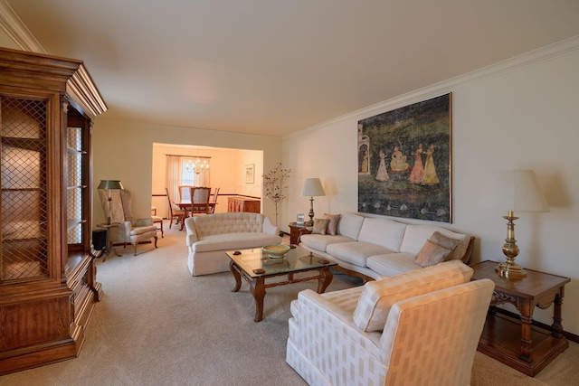 carpeted living area with a notable chandelier and ornamental molding