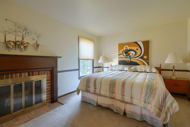 bedroom with carpet flooring, a fireplace, and baseboards