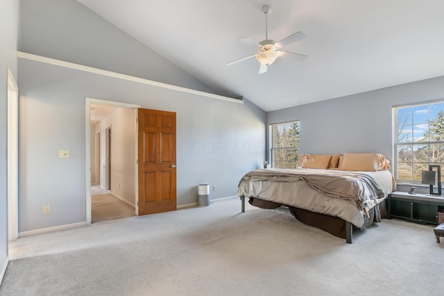 bedroom featuring baseboards, carpet floors, high vaulted ceiling, and a ceiling fan