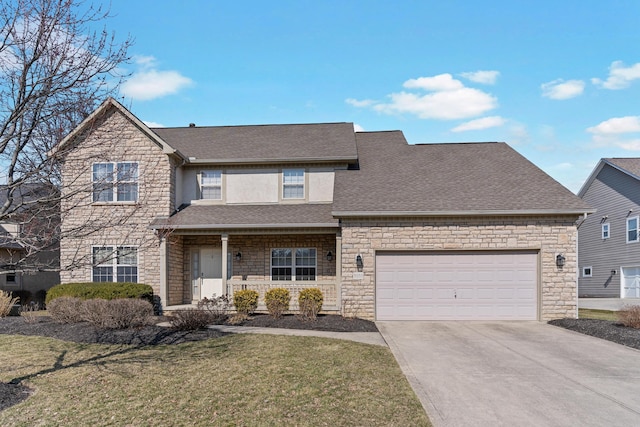 view of front of property with stone siding, concrete driveway, a front yard, a shingled roof, and a garage