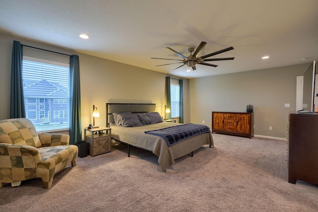 bedroom featuring recessed lighting, a ceiling fan, baseboards, and light carpet