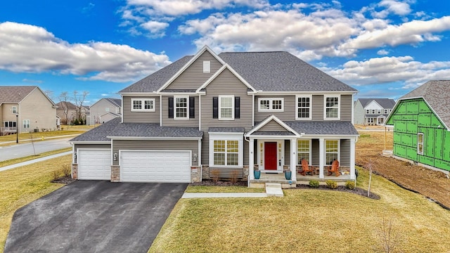 view of front of home with aphalt driveway, a garage, covered porch, and roof with shingles