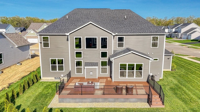 5511 Timber Heights Ln, Grove City, OH 43123 - back of house featuring a yard, a residential view, a wooden deck, and a shingled roof