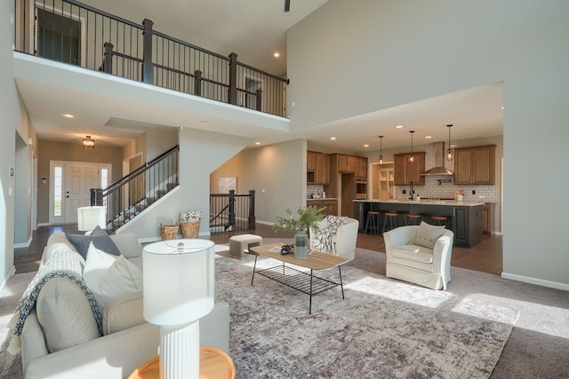5511 Timber Heights Ln, Grove City, OH 43123 - living area with stairs, recessed lighting, baseboards, and a towering ceiling