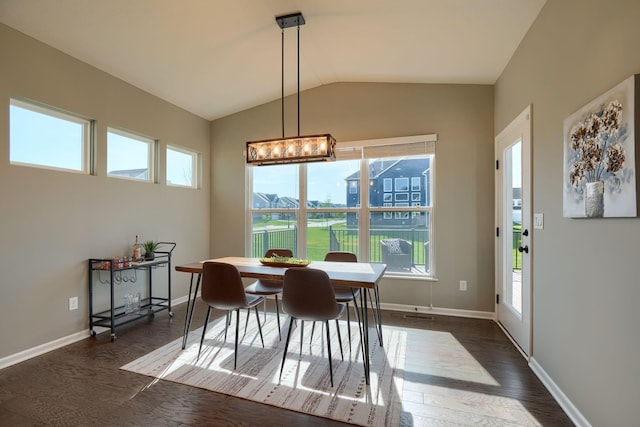 5511 Timber Heights Ln, Grove City, OH 43123 - dining room with baseboards, plenty of natural light, vaulted ceiling, and dark wood-style floors