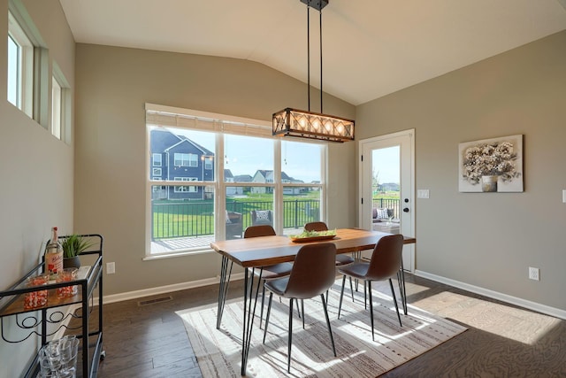 5511 Timber Heights Ln, Grove City, OH 43123 - dining space featuring visible vents, dark wood finished floors, baseboards, a notable chandelier, and lofted ceiling