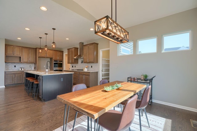 5511 Timber Heights Ln, Grove City, OH 43123 - dining space featuring dark wood-type flooring, recessed lighting, and baseboards