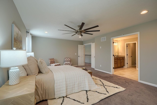 5511 Timber Heights Ln, Grove City, OH 43123 - bedroom with carpet flooring, connected bathroom, recessed lighting, baseboards, and visible vents