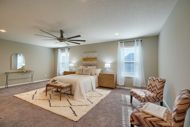 5511 Timber Heights Ln, Grove City, OH 43123 - carpeted bedroom featuring baseboards, a textured ceiling, and ceiling fan