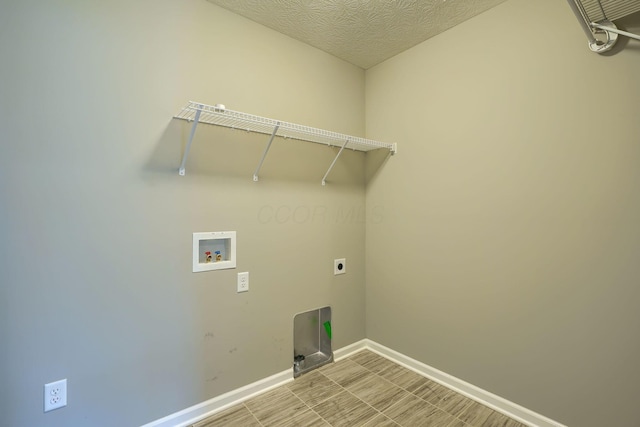 5511 Timber Heights Ln, Grove City, OH 43123 - laundry room featuring washer hookup, baseboards, laundry area, and electric dryer hookup