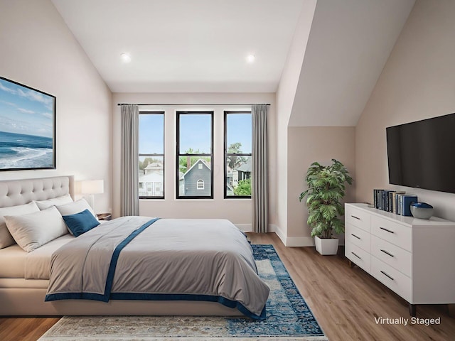 1095 Franklin Ave, Columbus, OH 43205 - bedroom featuring lofted ceiling, light wood-style floors, and recessed lighting