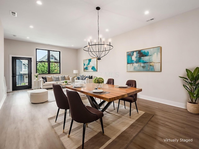 1095 Franklin Ave, Columbus, OH 43205 - dining area with wood finished floors, recessed lighting, and a chandelier
