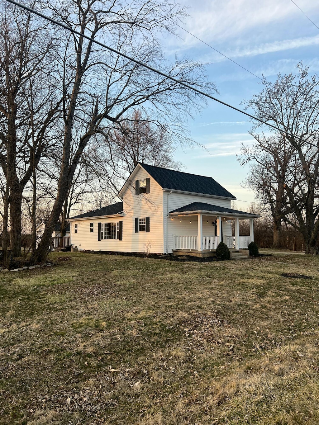 exterior space with a yard and covered porch