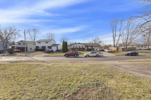 view of yard featuring a residential view