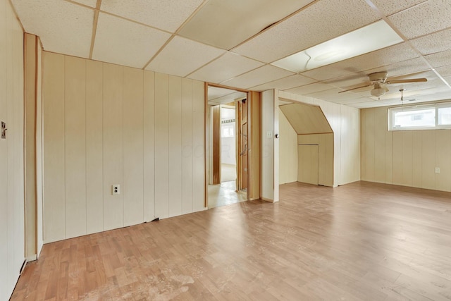 additional living space featuring a ceiling fan and light wood-style floors