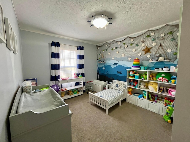 bedroom with a textured ceiling and carpet flooring