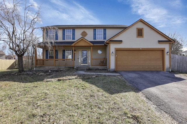 traditional-style home featuring fence, covered porch, a front lawn, a garage, and aphalt driveway