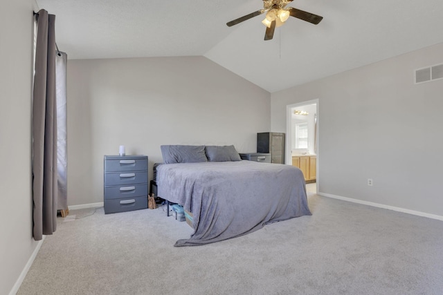 bedroom with visible vents, light carpet, lofted ceiling, baseboards, and ceiling fan