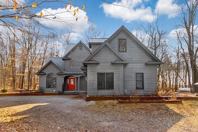 view of front of property featuring metal roof