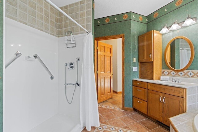 full bath with tile patterned flooring, vanity, and a shower with shower curtain