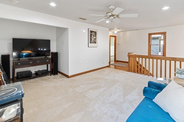 living room with visible vents, a ceiling fan, recessed lighting, carpet, and baseboards