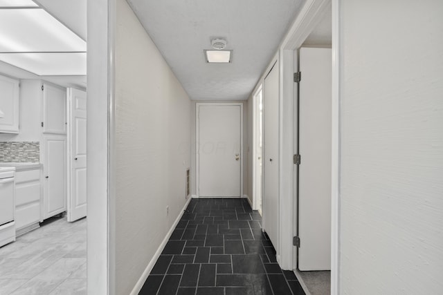 hallway with baseboards