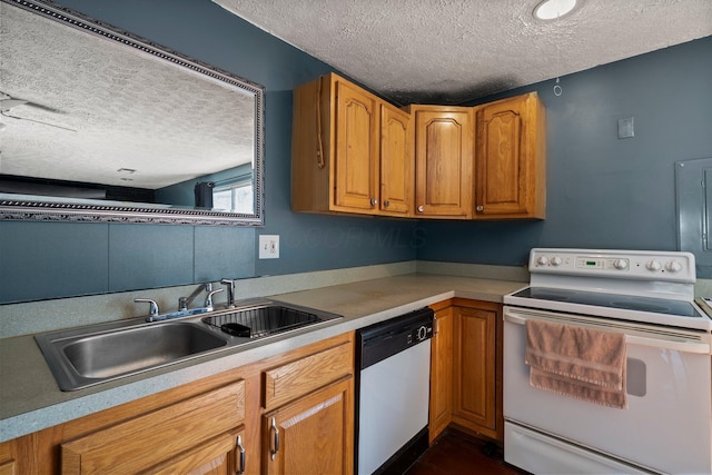 kitchen featuring dishwasher, a sink, brown cabinets, and white range with electric cooktop