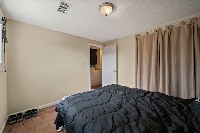 bedroom with baseboards, visible vents, carpet floors, and a textured ceiling