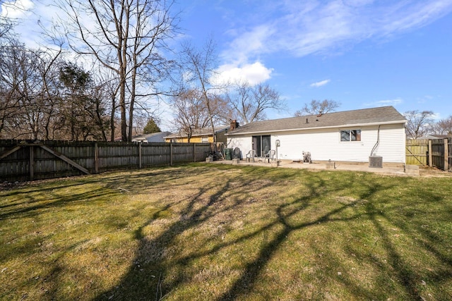 view of yard featuring a patio area and a fenced backyard