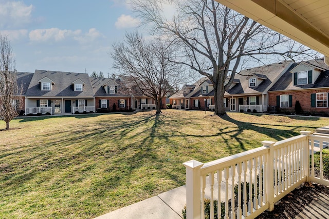 view of yard with a residential view